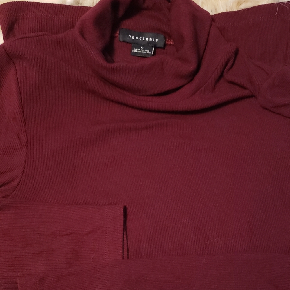 2 turtleneck sweaters med
